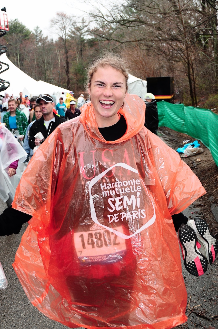 Wet but excited, wearing my leftover Semi de Paris rain poncho